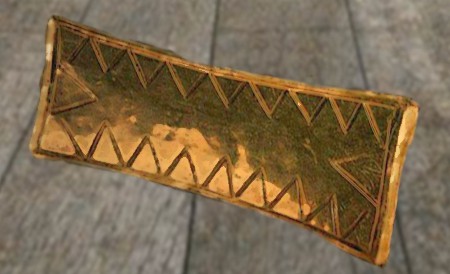 D'après une pendeloque en or, tumulus de La Motta, vers 2000-1600 avjc, Côtes d'Armor, France, âge du Bronze. (Marsailly/Blogostelle)